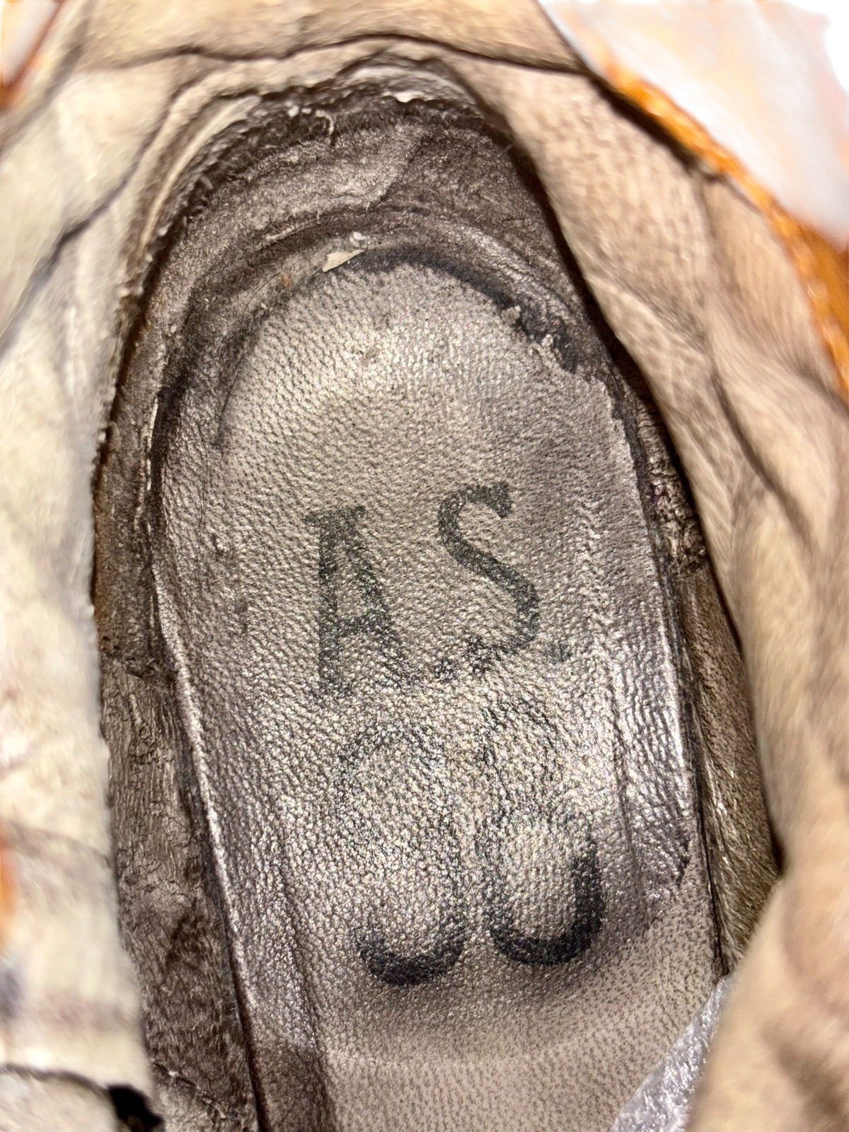 Brown leather boot insole with embossed A.S.98 logo