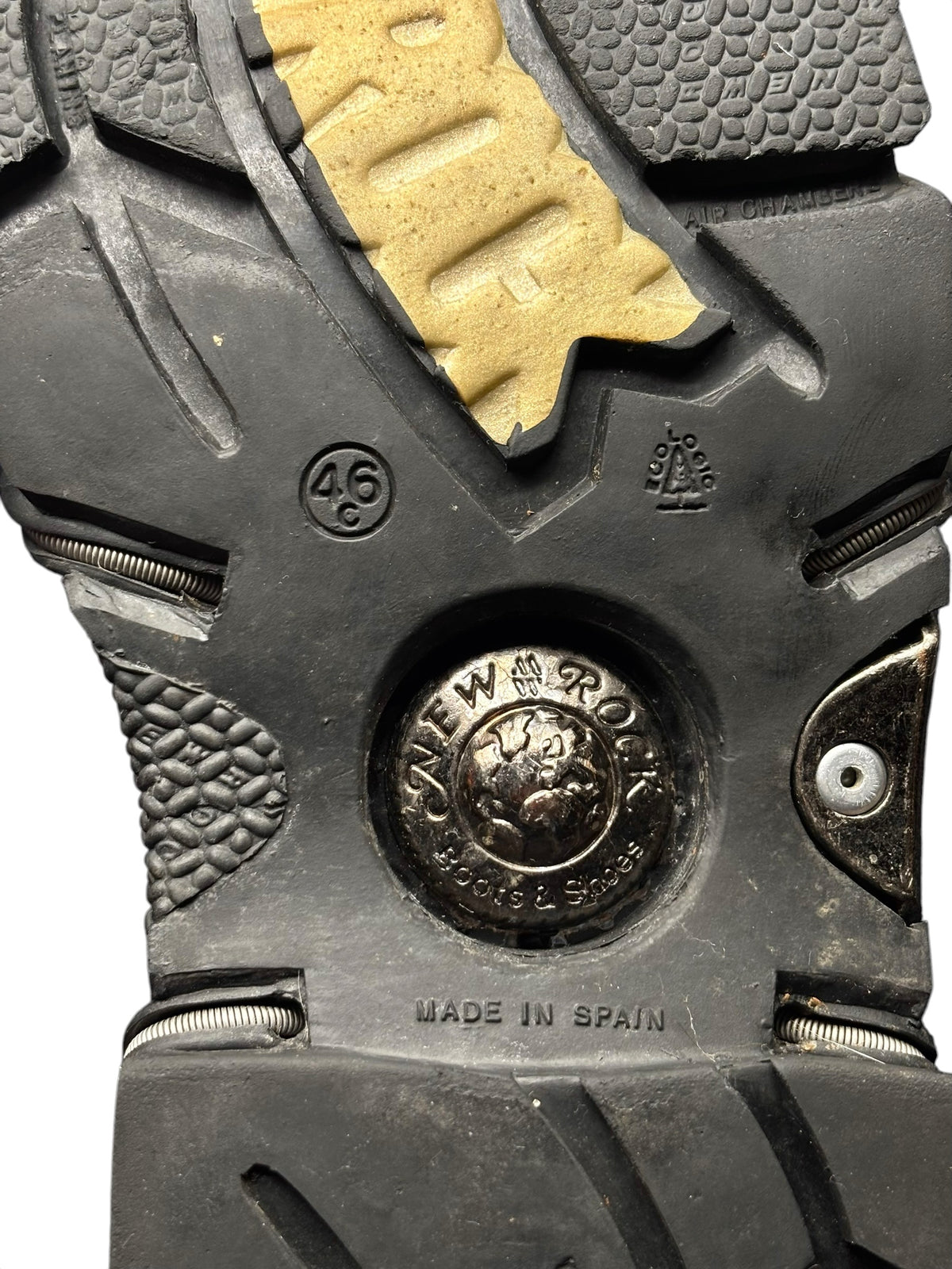 New Rock vintage boot sole close-up with tread pattern and NEW ROCK medal detail