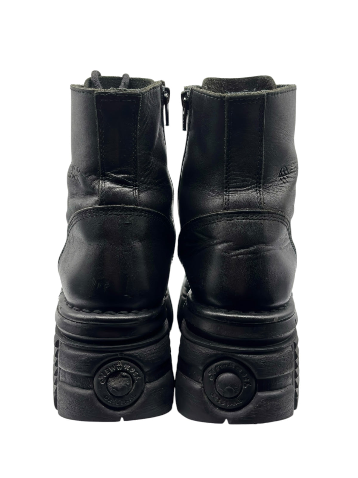 New Rock Mili black leather platform boots, back view with round heel logo and tread sole