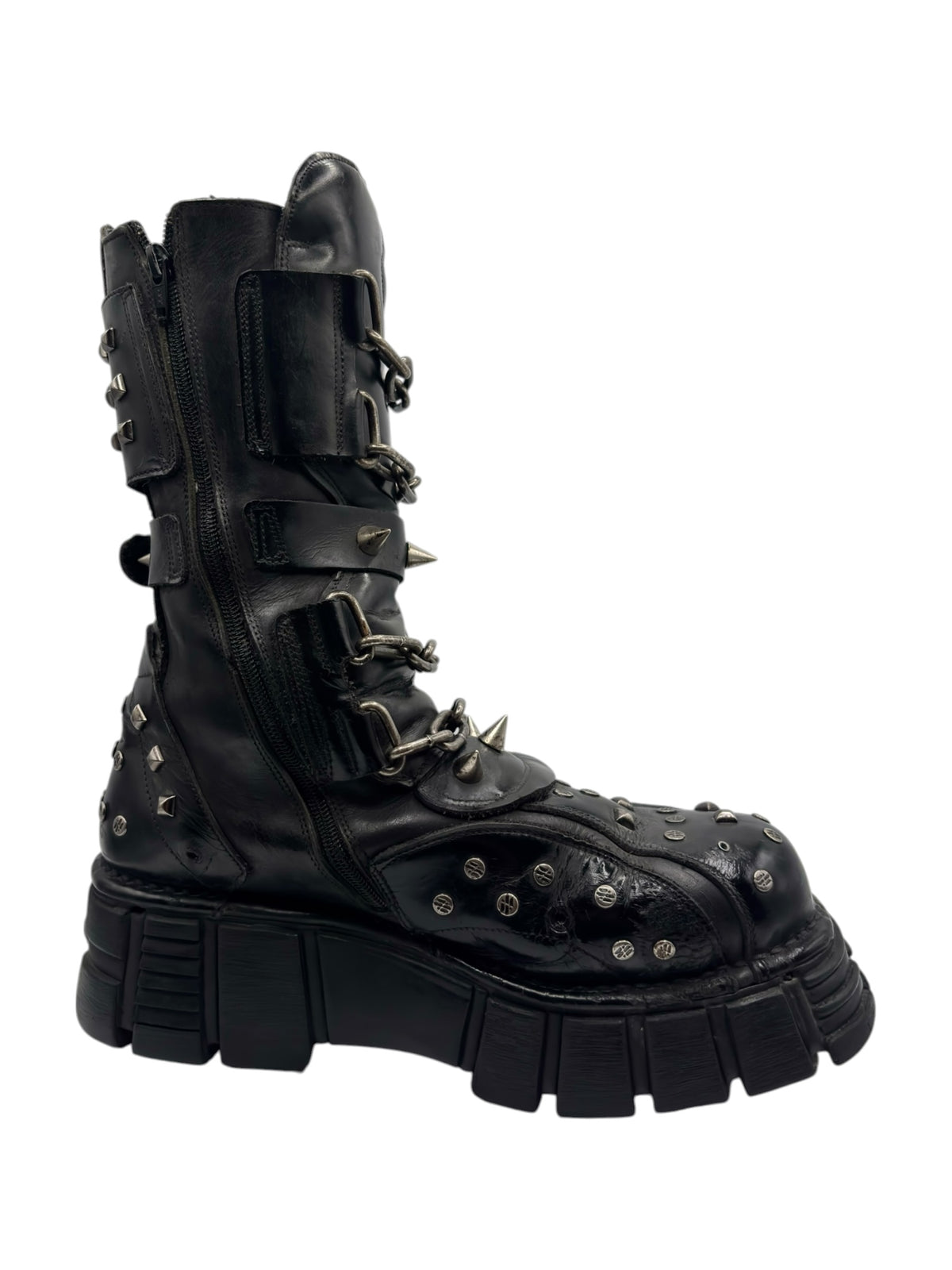 Studded chain platform boots in black, angled side view with lace-up panel and studs