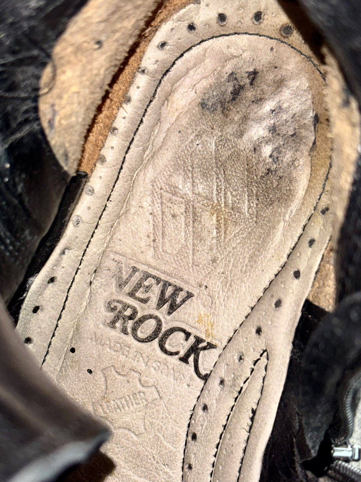 Mid-calf platform boot insole with ROCK logo and small printed details