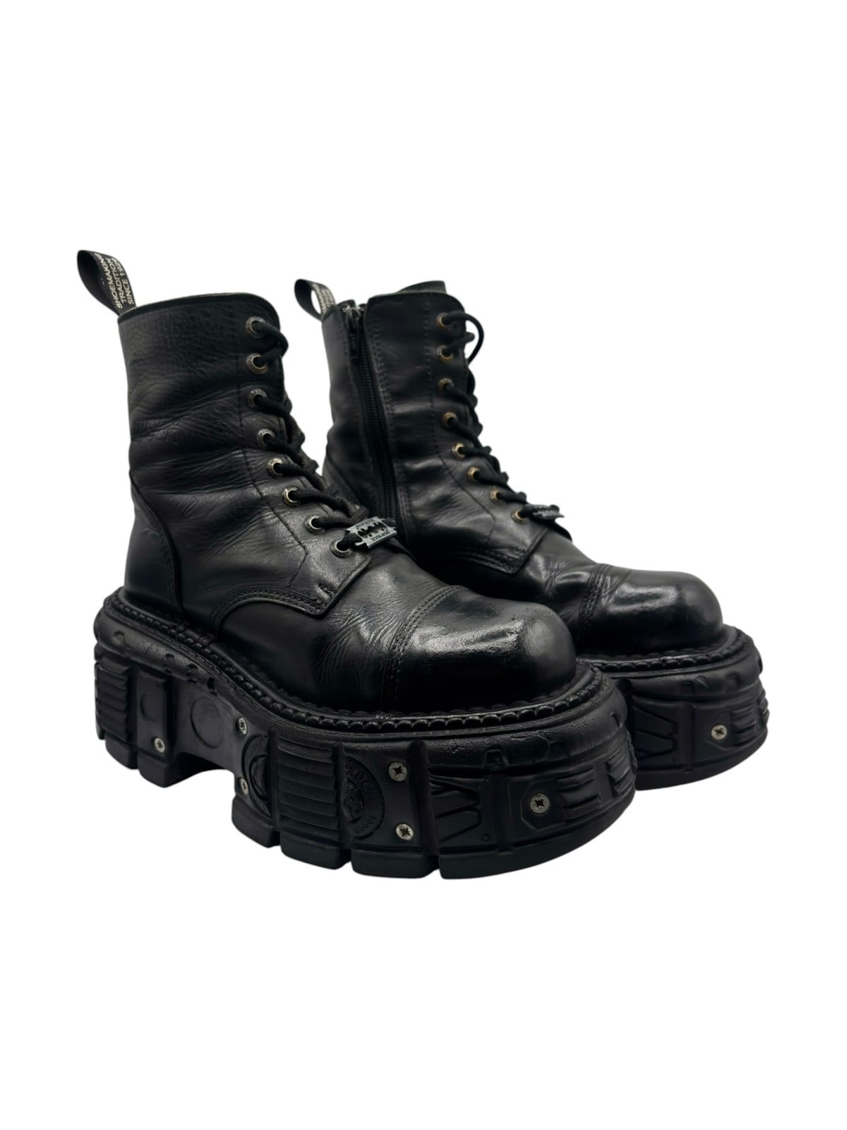 Black leather lace-up platform boots with chunky lug sole and high ankle shaft