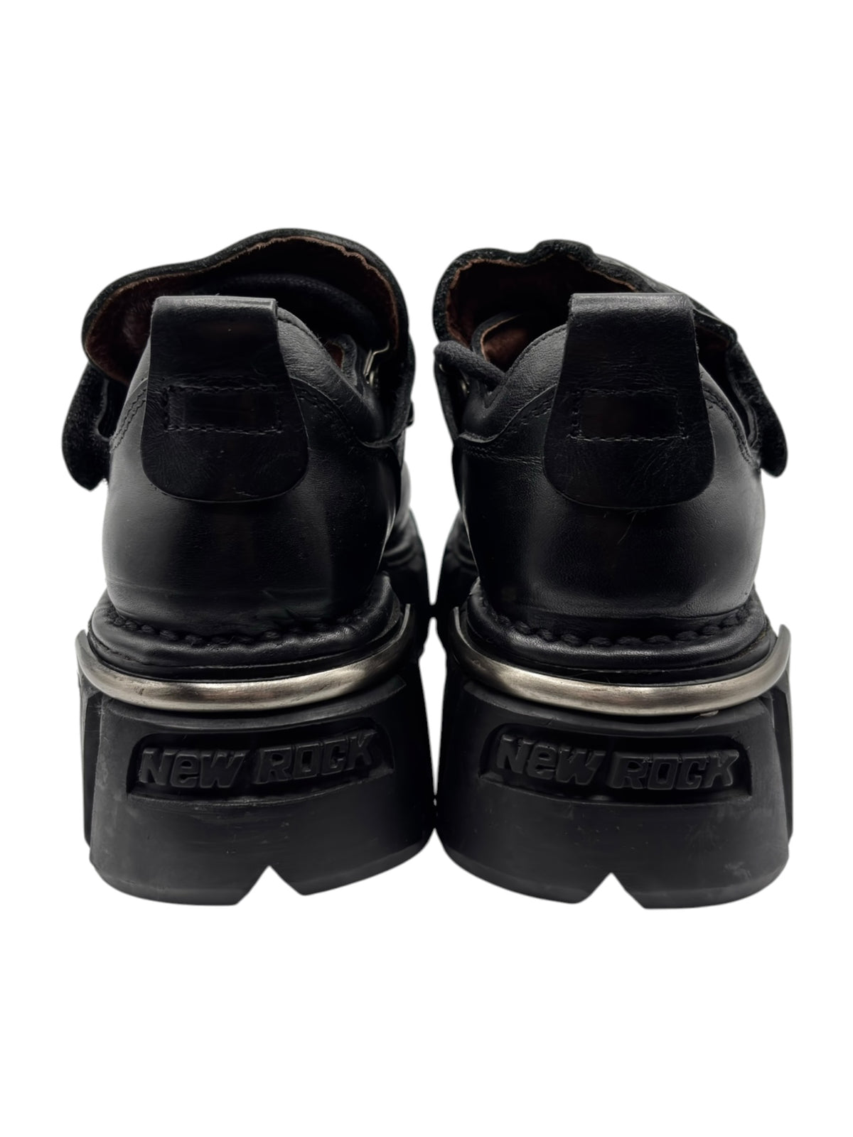 Back view of black New Rock platform boots with heel tabs and New Rock branding