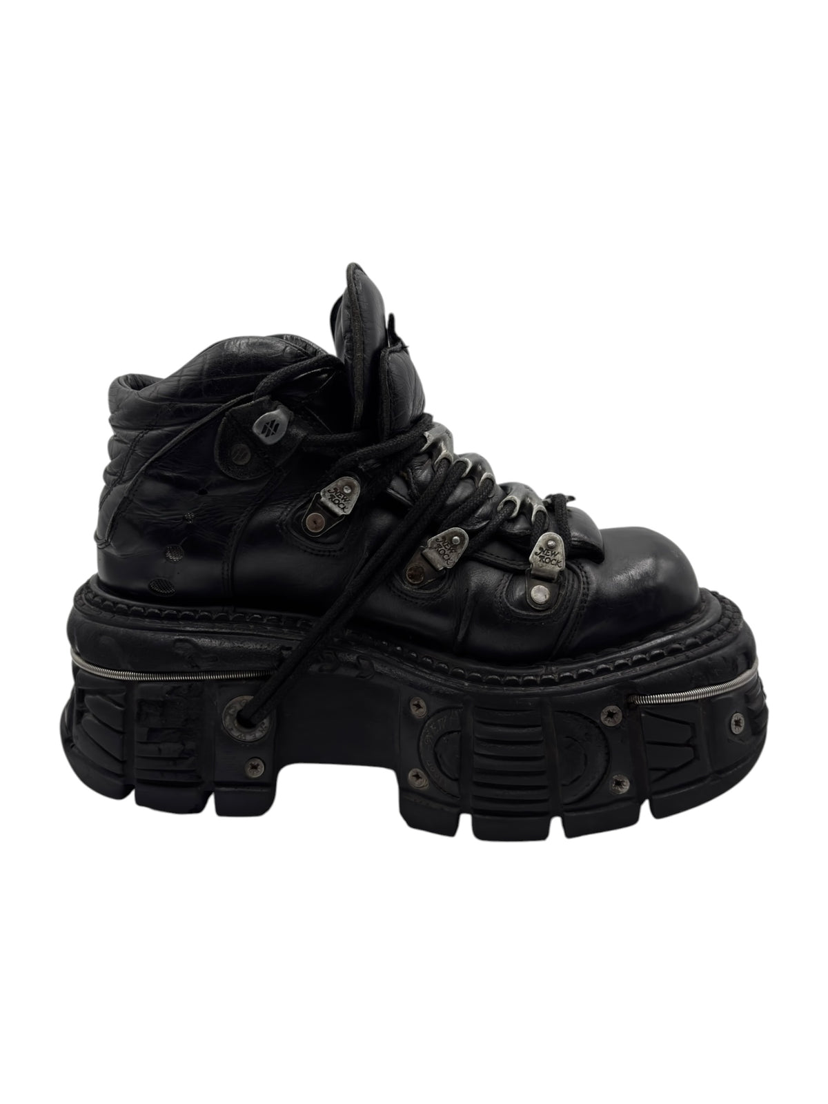 Black platform ankle boots with lace-up front and chunky outsole, angled view.