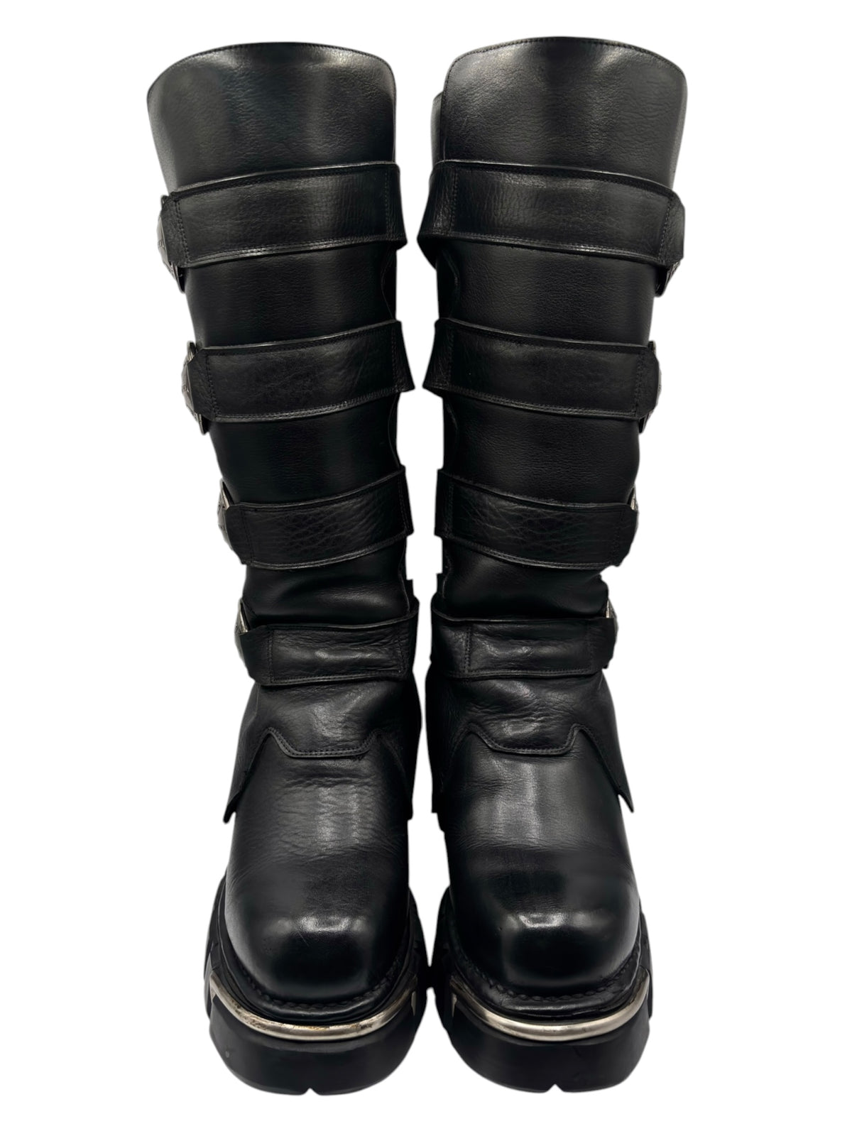 Knee-high boots in dark black with layered straps and silver-edged chunky sole
