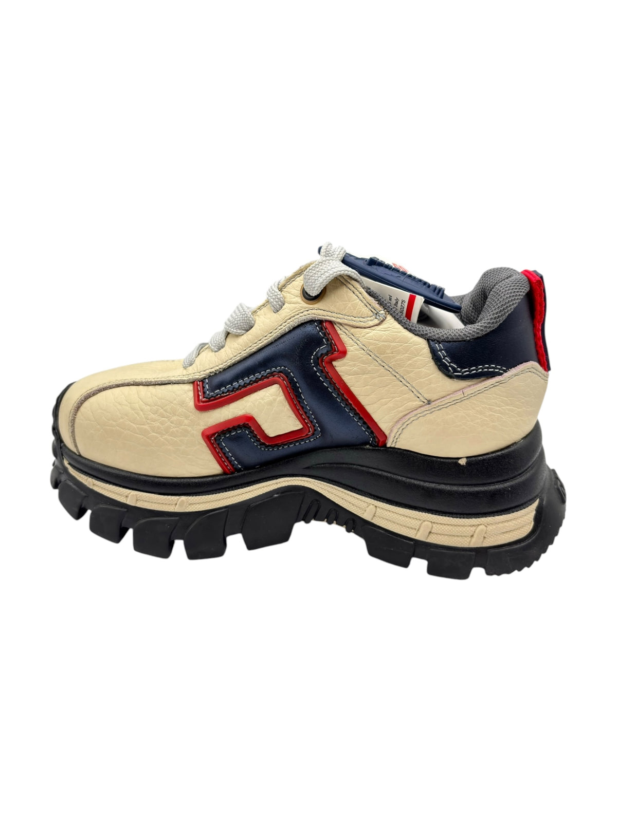 Beige platform sneakers with navy heel accents and red blue side patch
