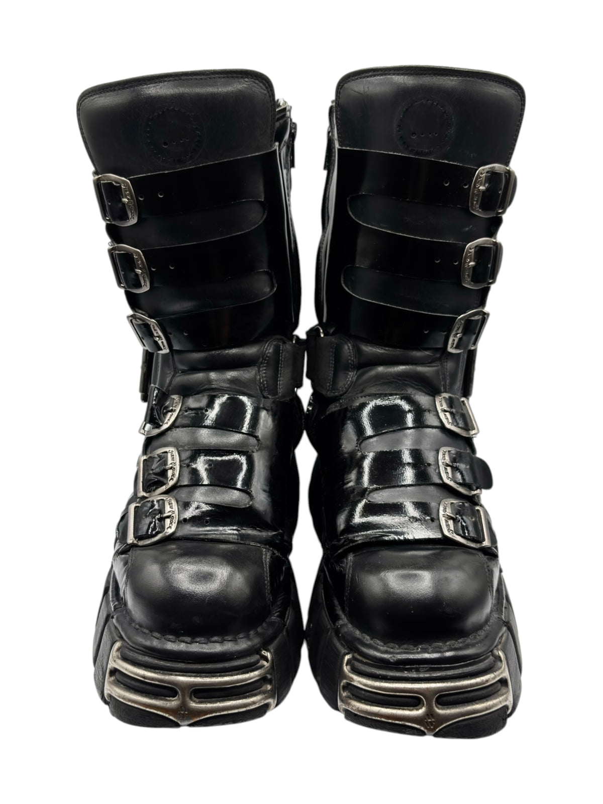 Black vintage leather boots with three buckles and chunky platform sole