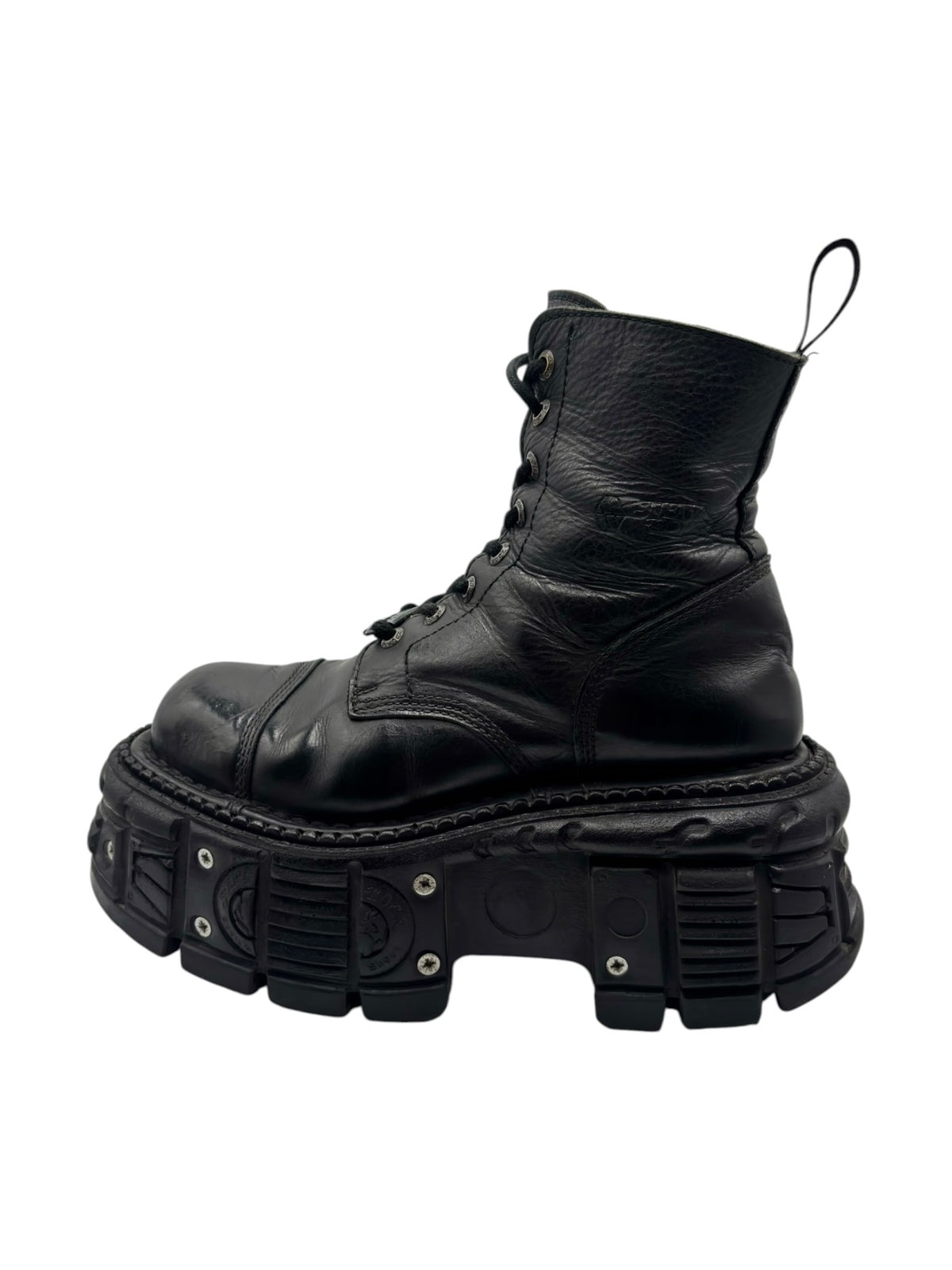 Black lace-up platform boots with thick lug sole and high ankle shaft.