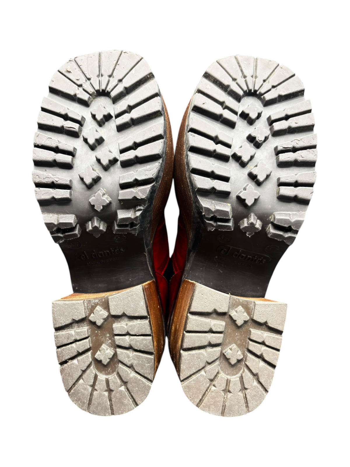 Pair of platform boot soles with rugged tread and starburst pattern