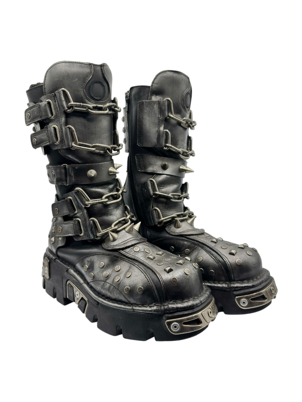 Studded chain moto boots, angled pair view with metal hardware and thick sole