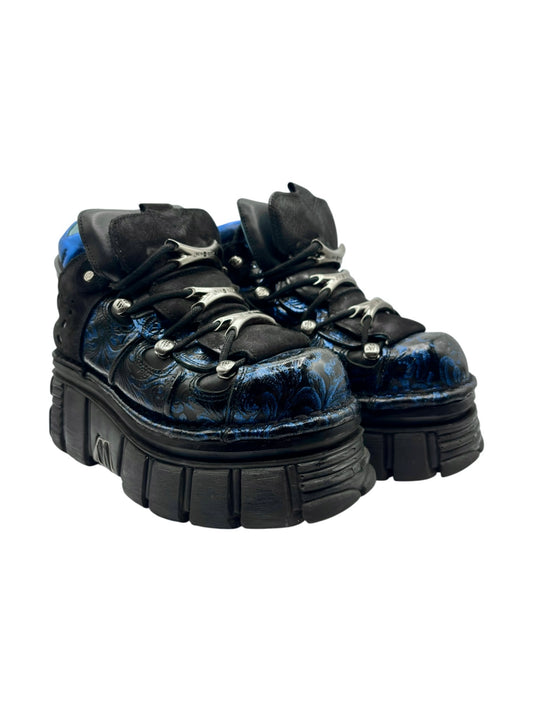 New Rock platform boots, side view with blue patterned vamp and chunky black sole