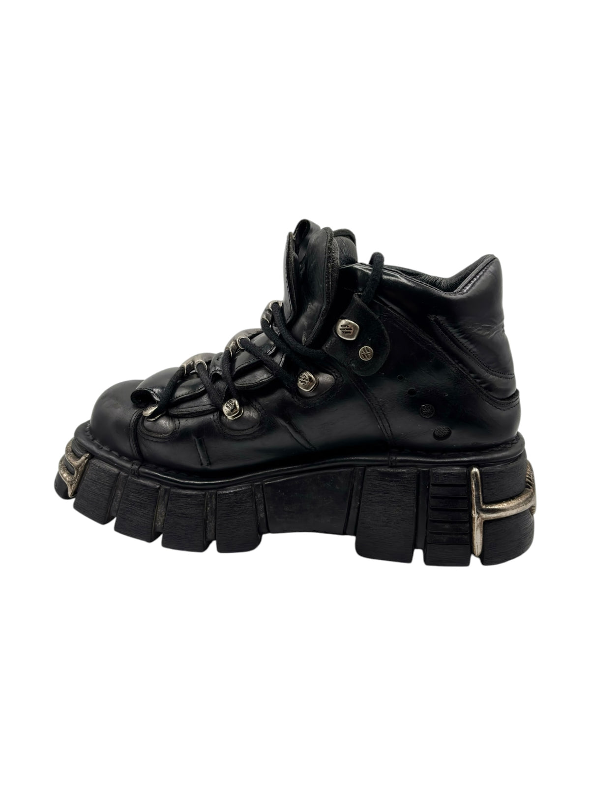 New Rock platform boots, side view with black upper, lace-up, and gold detail trims