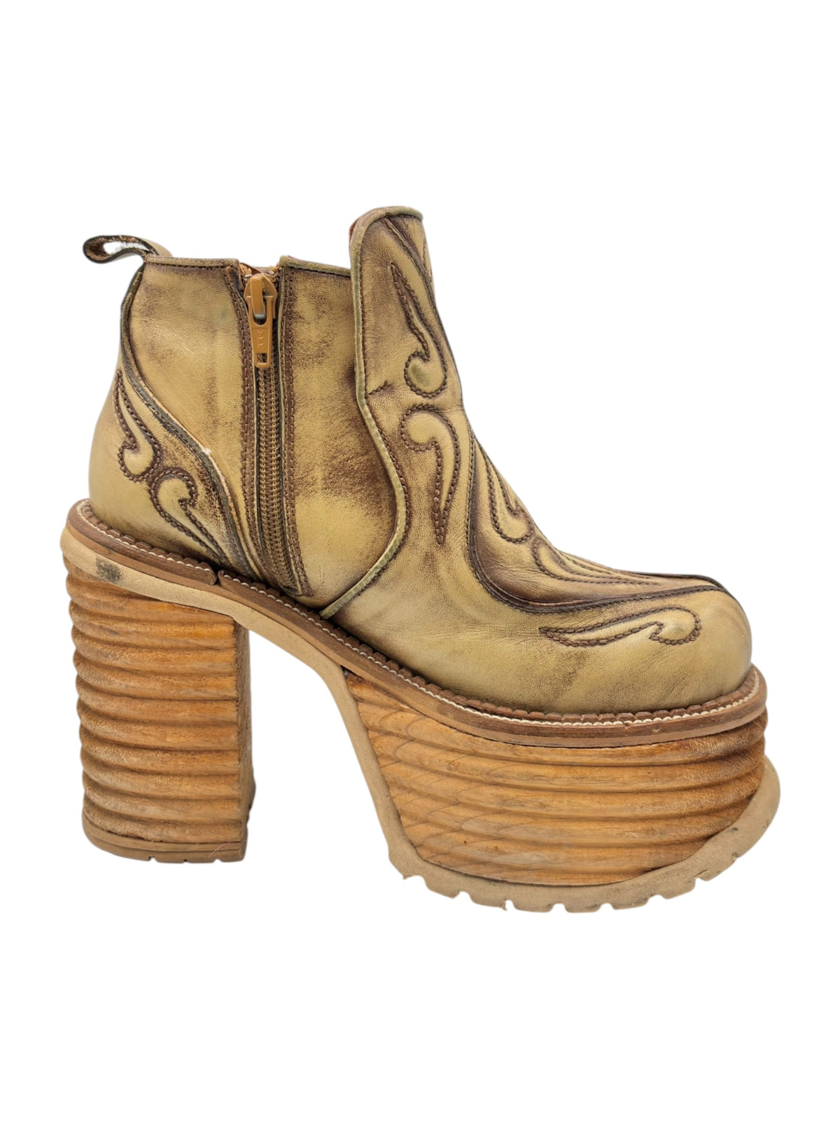 Khaki brown leather ankle boots with carved swirl accents and side zipper closure
