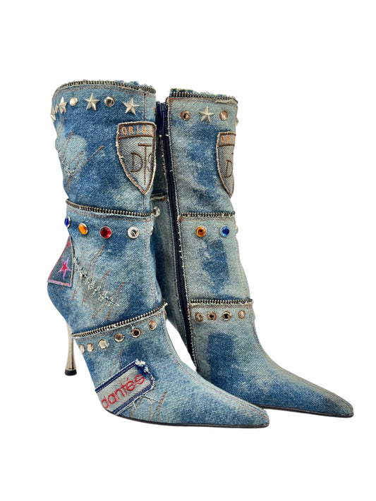 Mid-calf denim ankle boots with pointed toe, high heel, and studded decorative panels