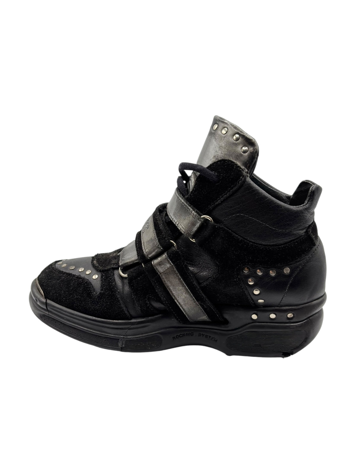 Black leather mid-top sneaker with side strap and perforated stud details