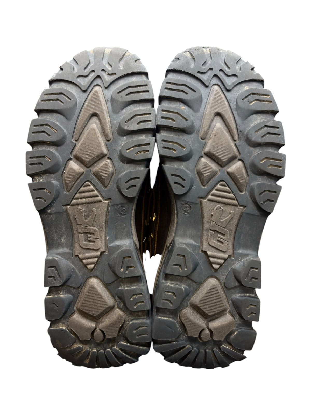 Shoe outsole pair with deep tread and textured traction lugs