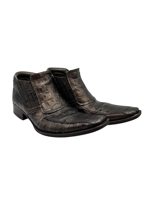 Pair of dark bronze leather cowboy boots with side gusset and low heel