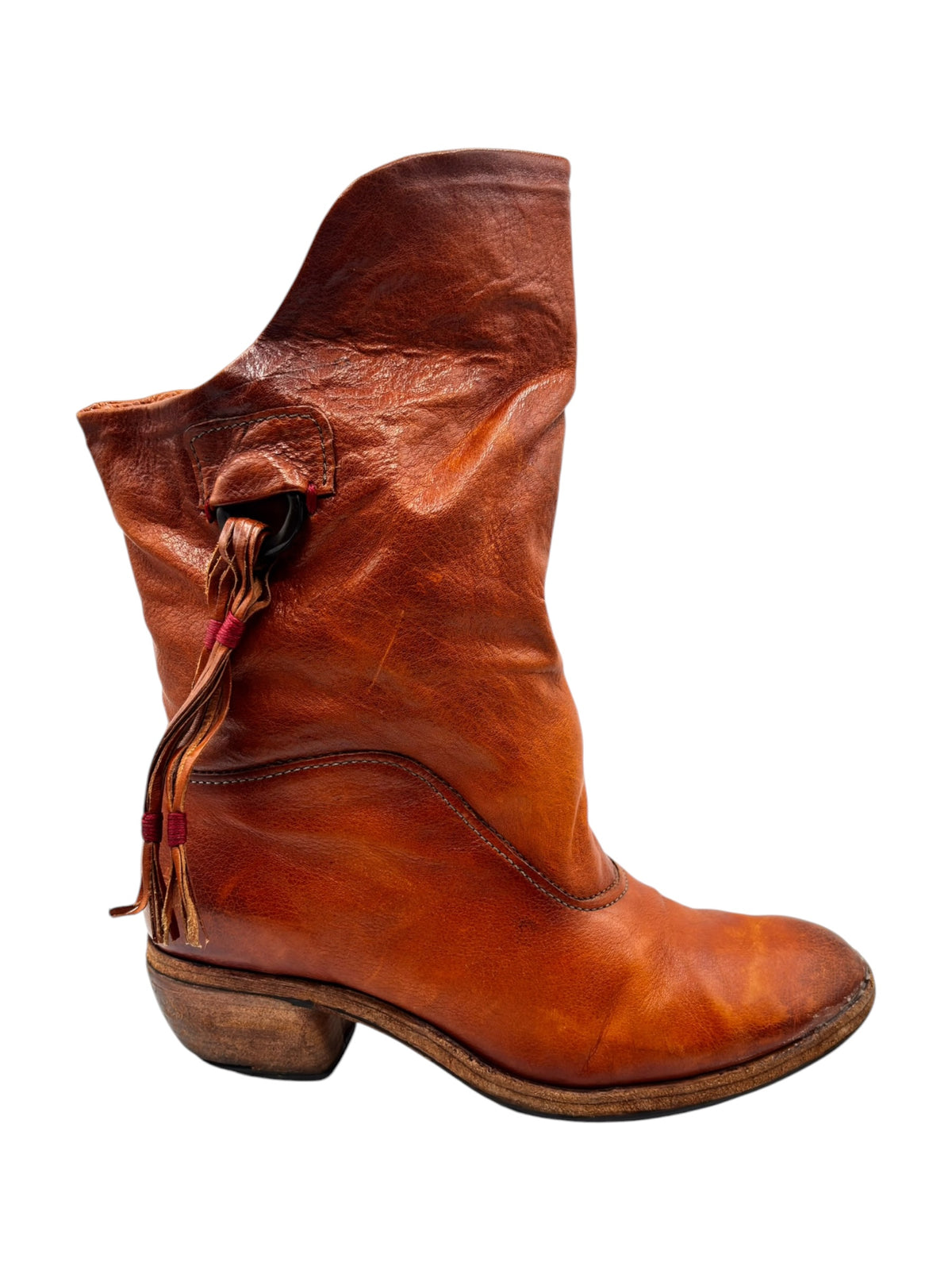 Leather mid-calf boots with tassel pull and seam details, side view