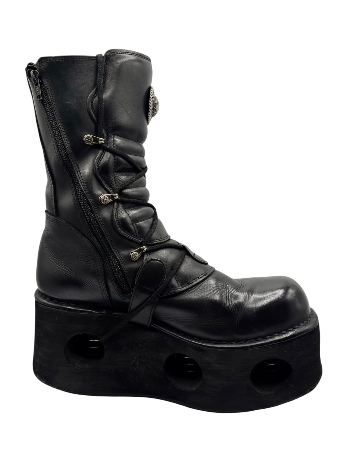 Black mid-calf platform boots with side zipper and crisscross lace-up straps