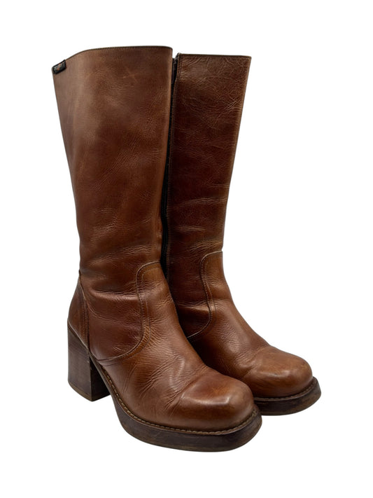 Brown leather knee-high boots with block heel and platform sole, side view