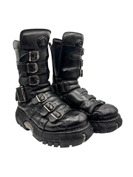 Black leather techno platform boots with multiple buckles and thick tread sole
