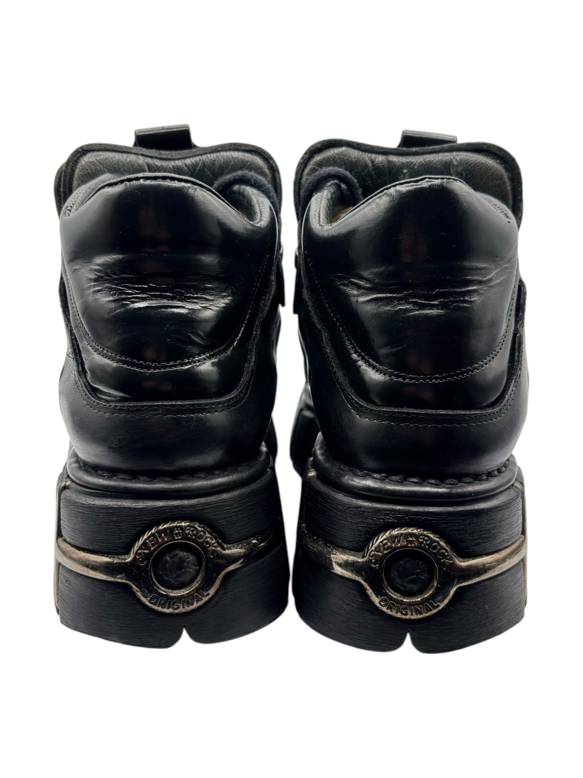 New Rock platform boots, back view in black with heel badge and padded collar