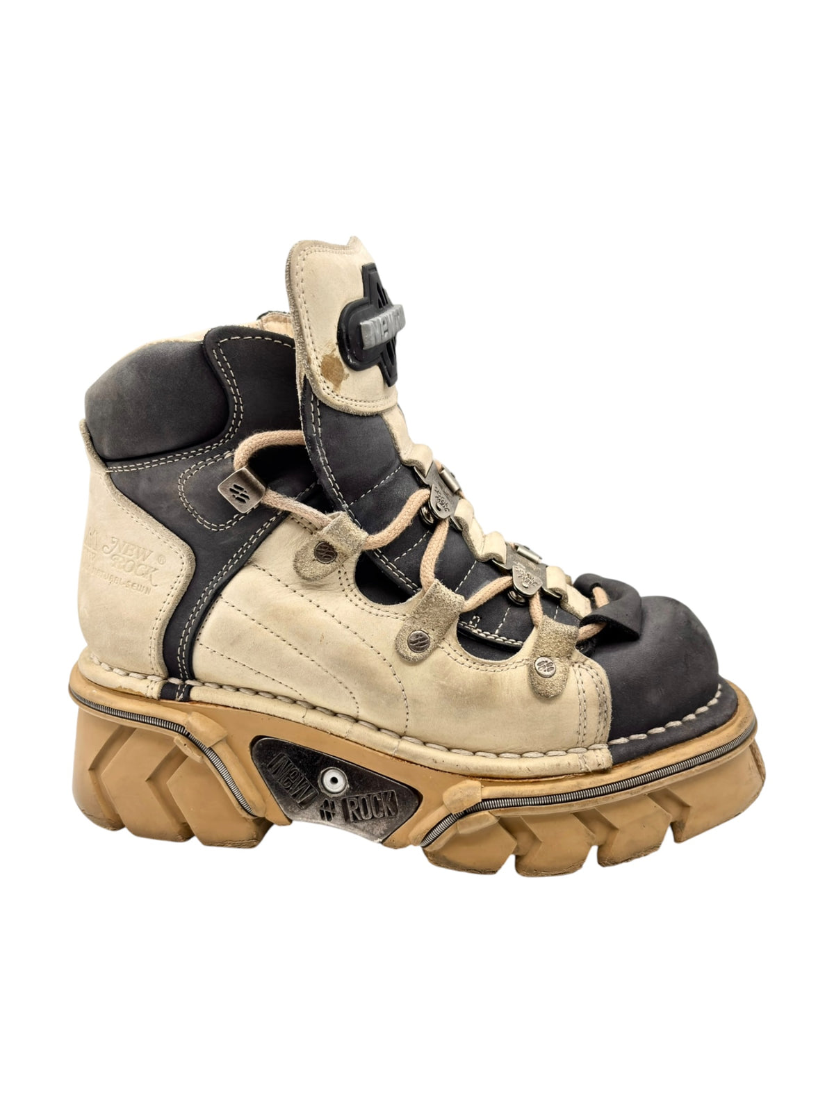 Beige and black leather lace-up platform boots with thick lug sole and side hardware