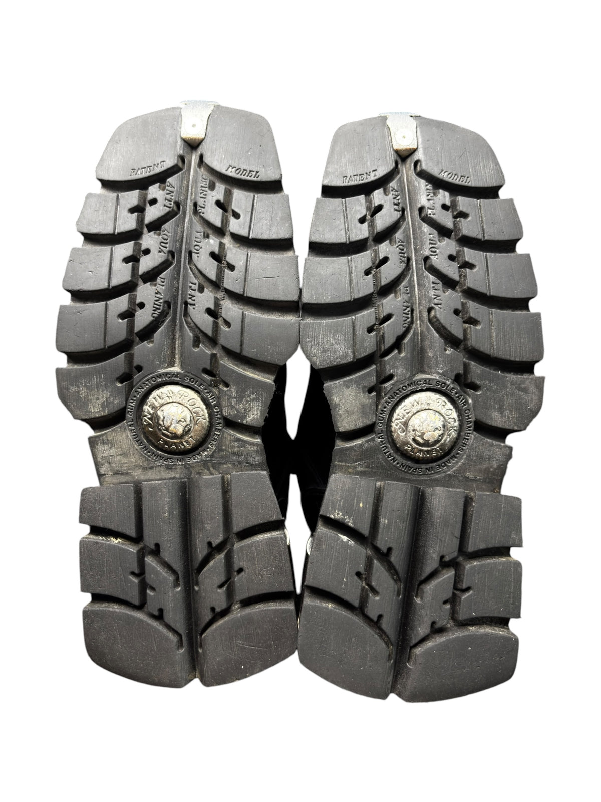 Vintage New Rock platform boots: two black tread soles with circular Planet emblems