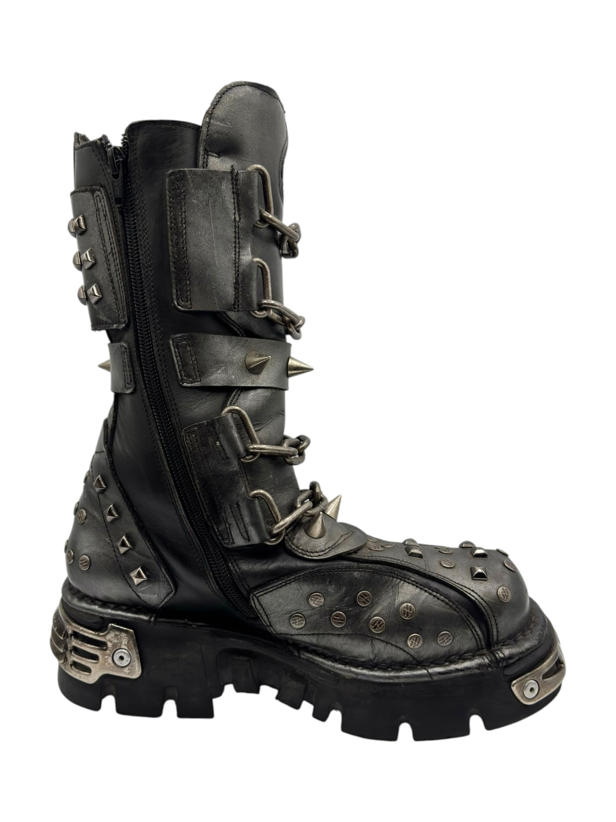 Vintage studded chain boots side view with two buckled straps and metal toe plate