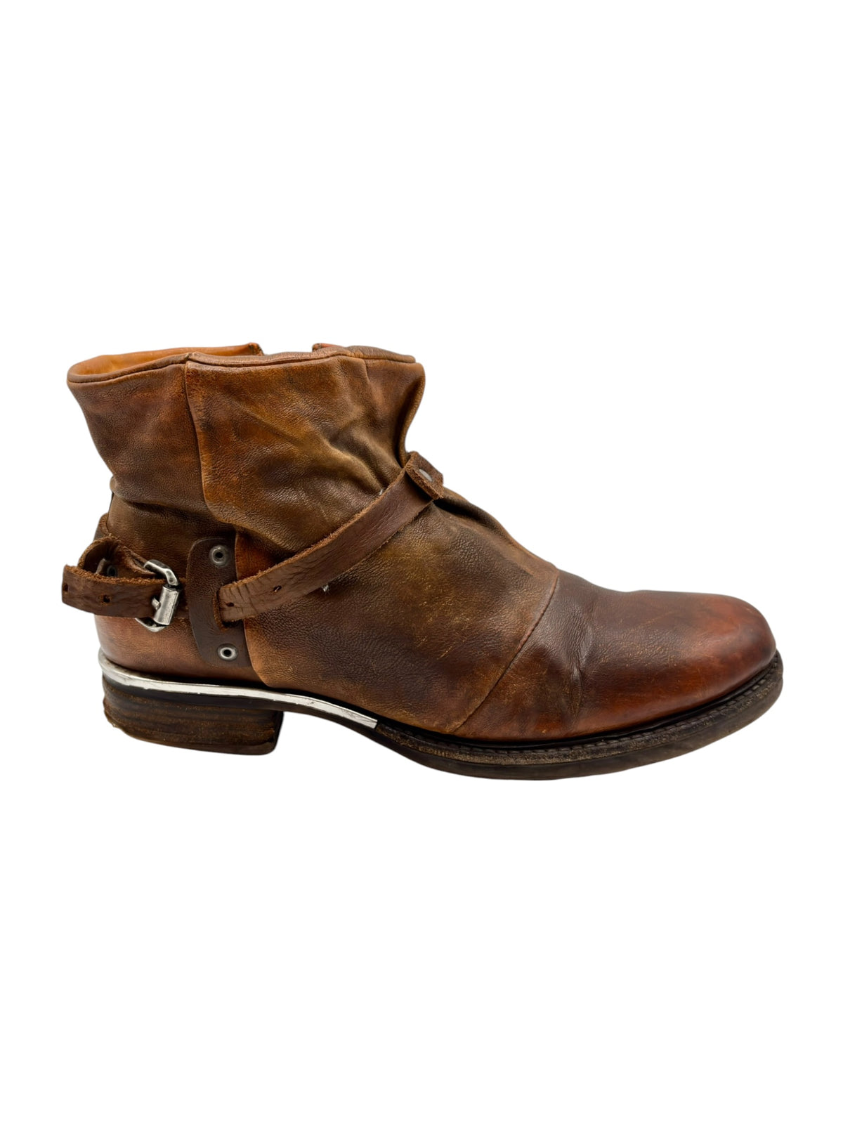 Brown leather ankle boots with side zipper, cuff opening, and low stacked heel