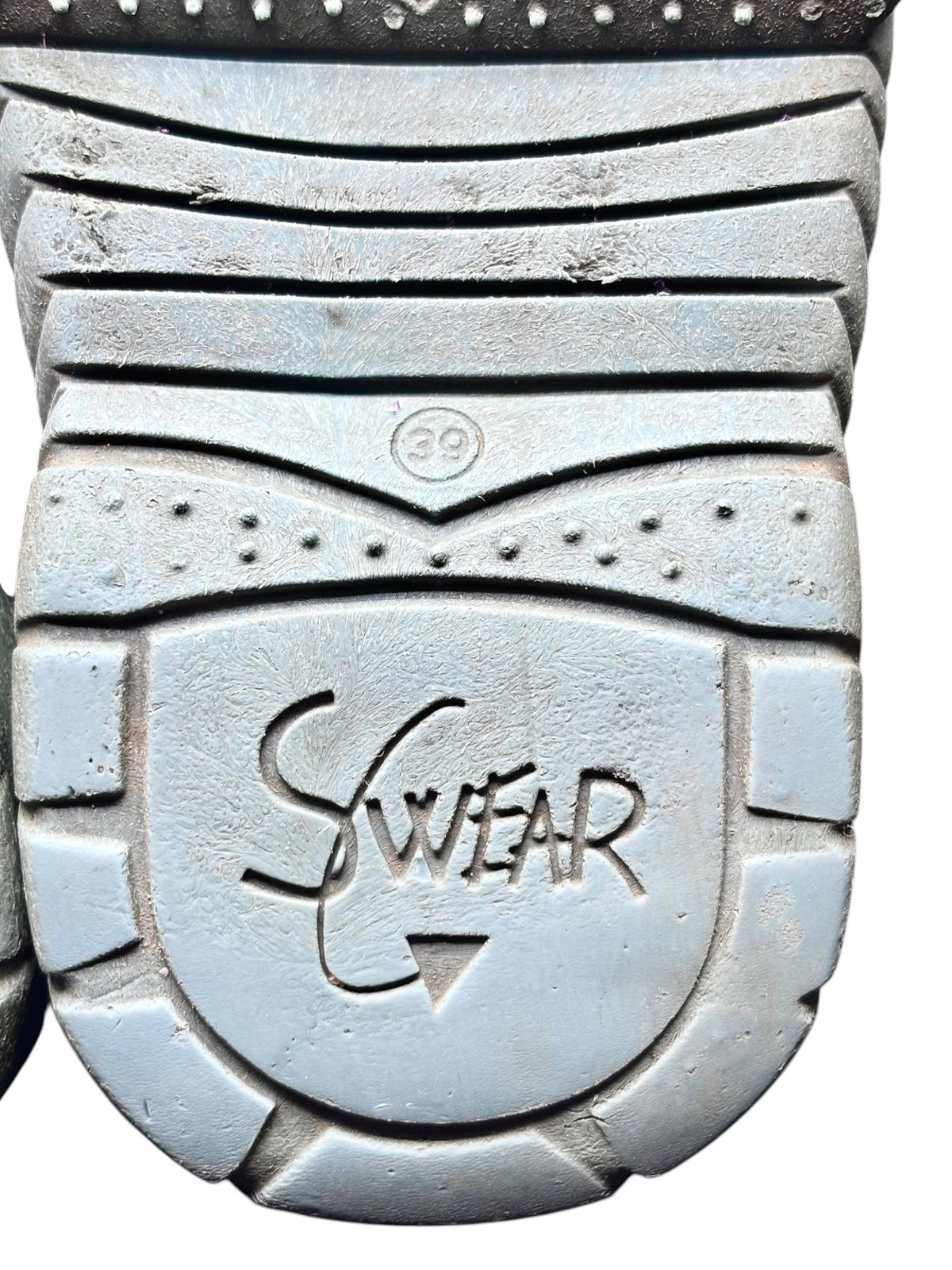 Swear platform boot outsole with tread pattern and Swear emblem