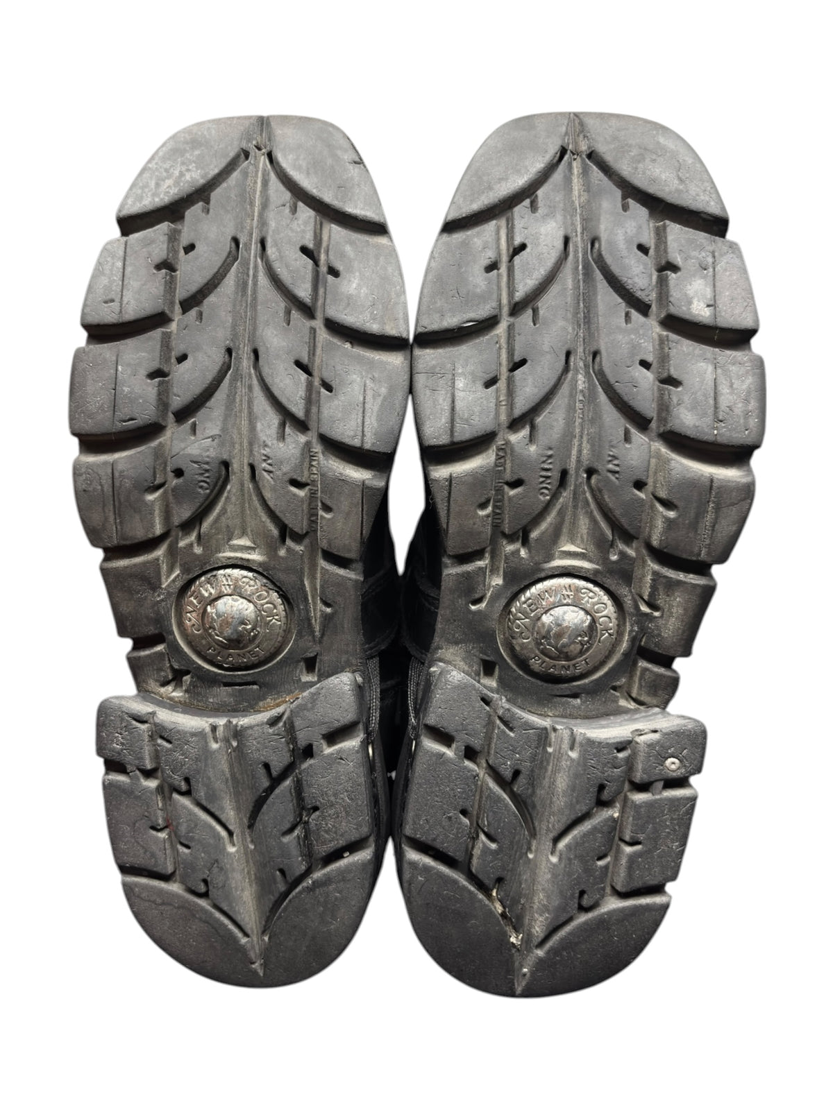 Pair of vintage raised-heel leather boots with rugged outsole bottoms