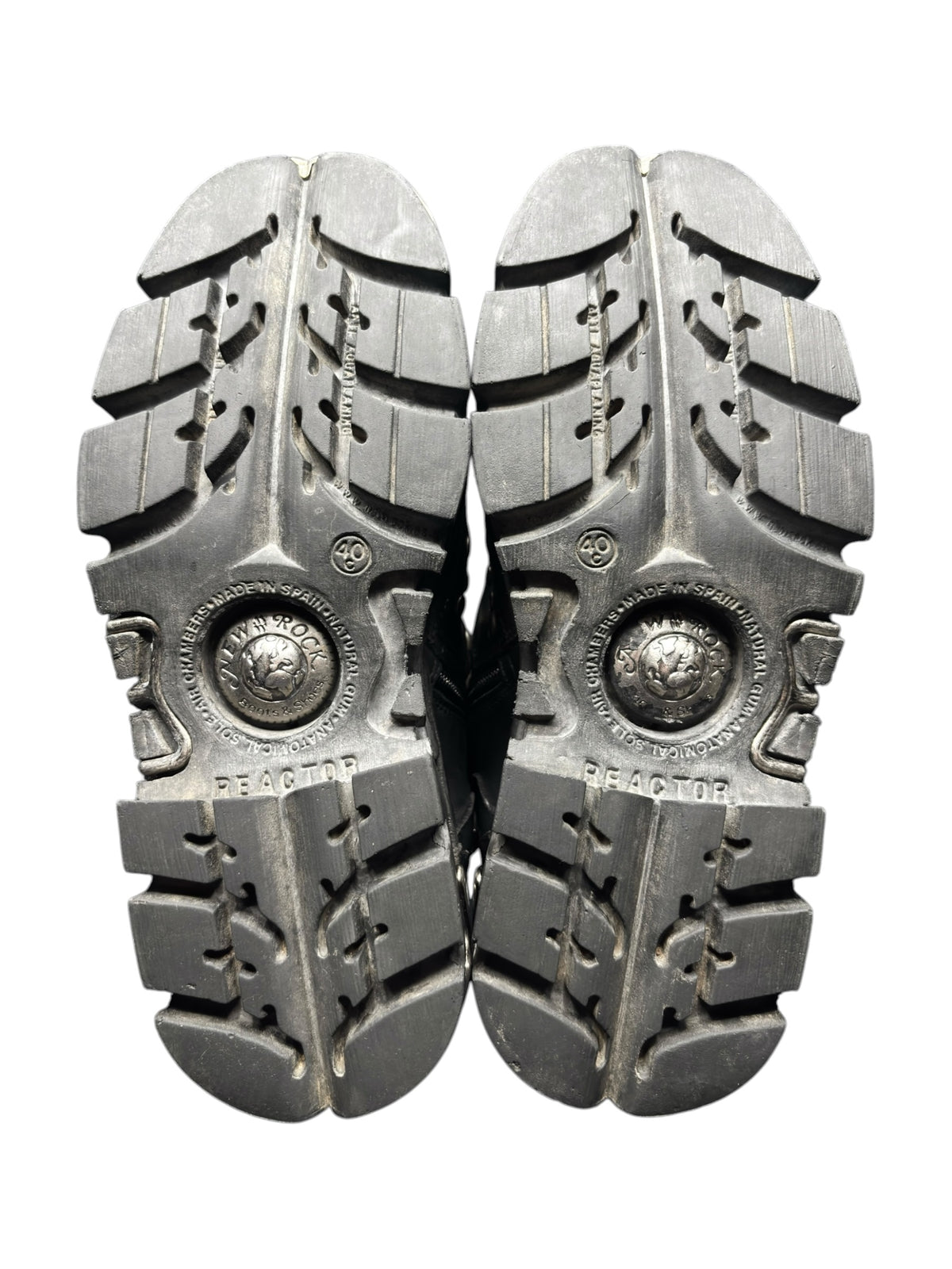 Vintage studded chain boots outsole view with deep tread and round toe-grip details