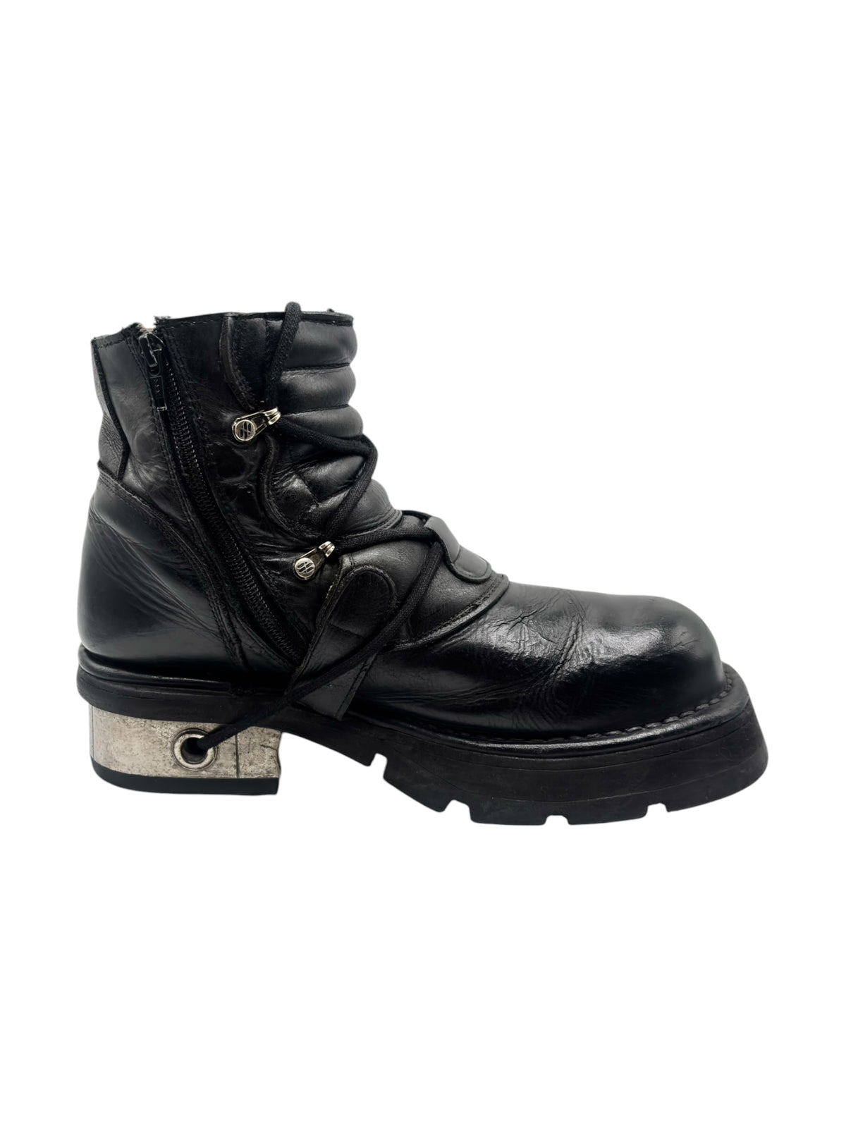 Black raised heel ankle boot with front zipper and buckle hardware detail