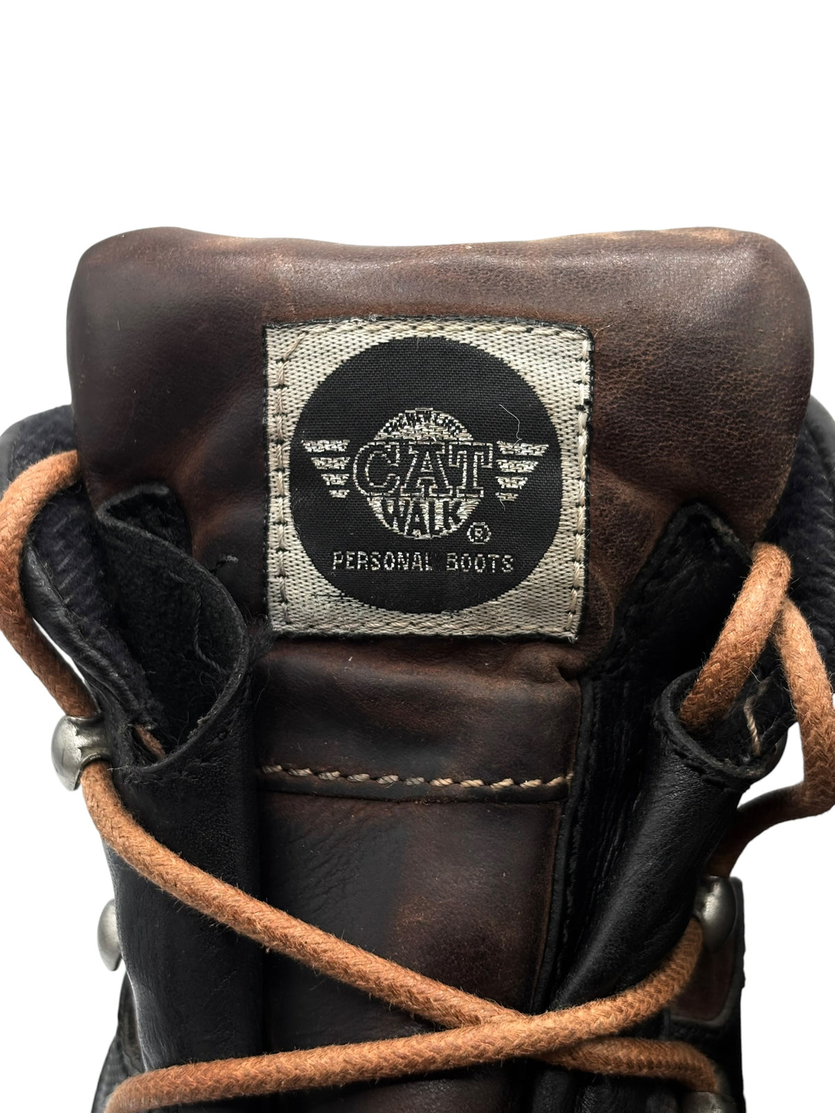 Brown leather boot tongue label: CAT WALK Personal Boots, with lace strap