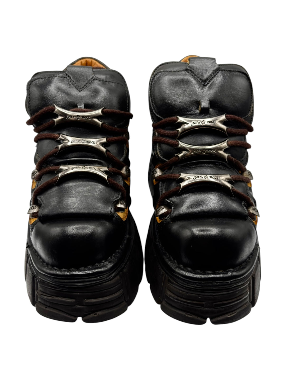 Black platform boots top view with lace tie and thick tread sole.