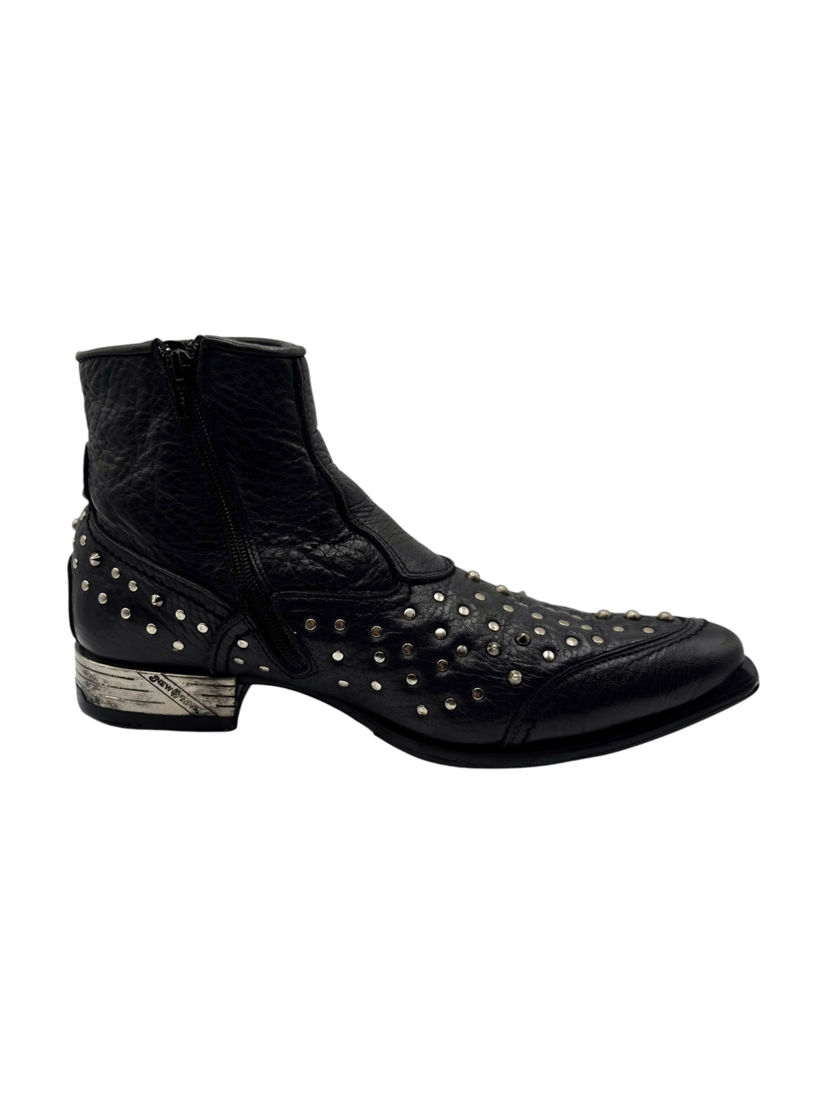 Black studded cowboy boot with low heel and metal stud accents on the toe and side.