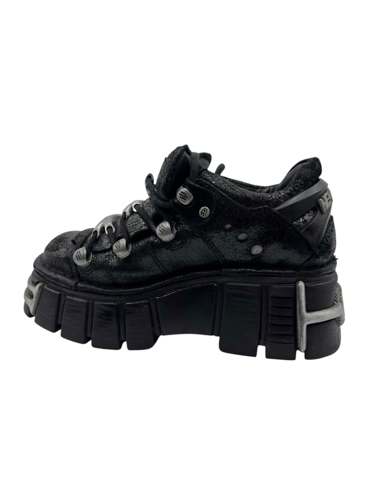 Black platform boots front quarter view with laces and large tread sole