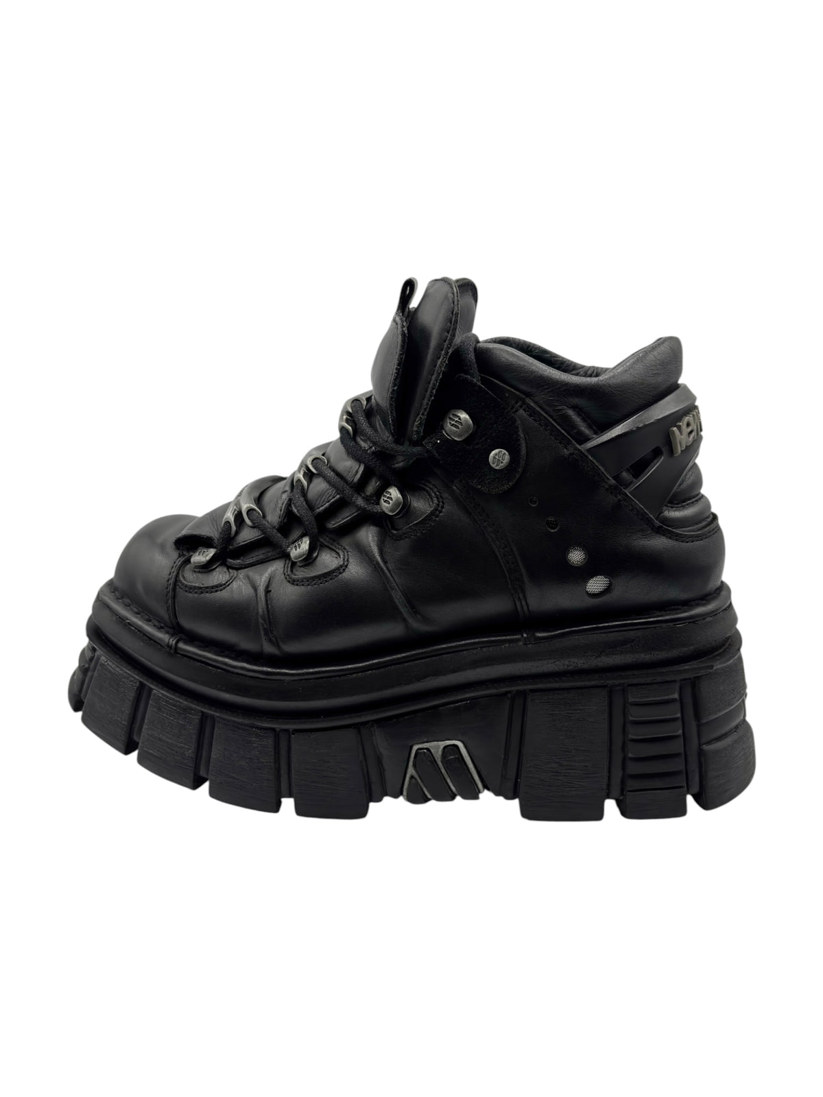 Black lace-up platform boots with thick sole and side eyelets