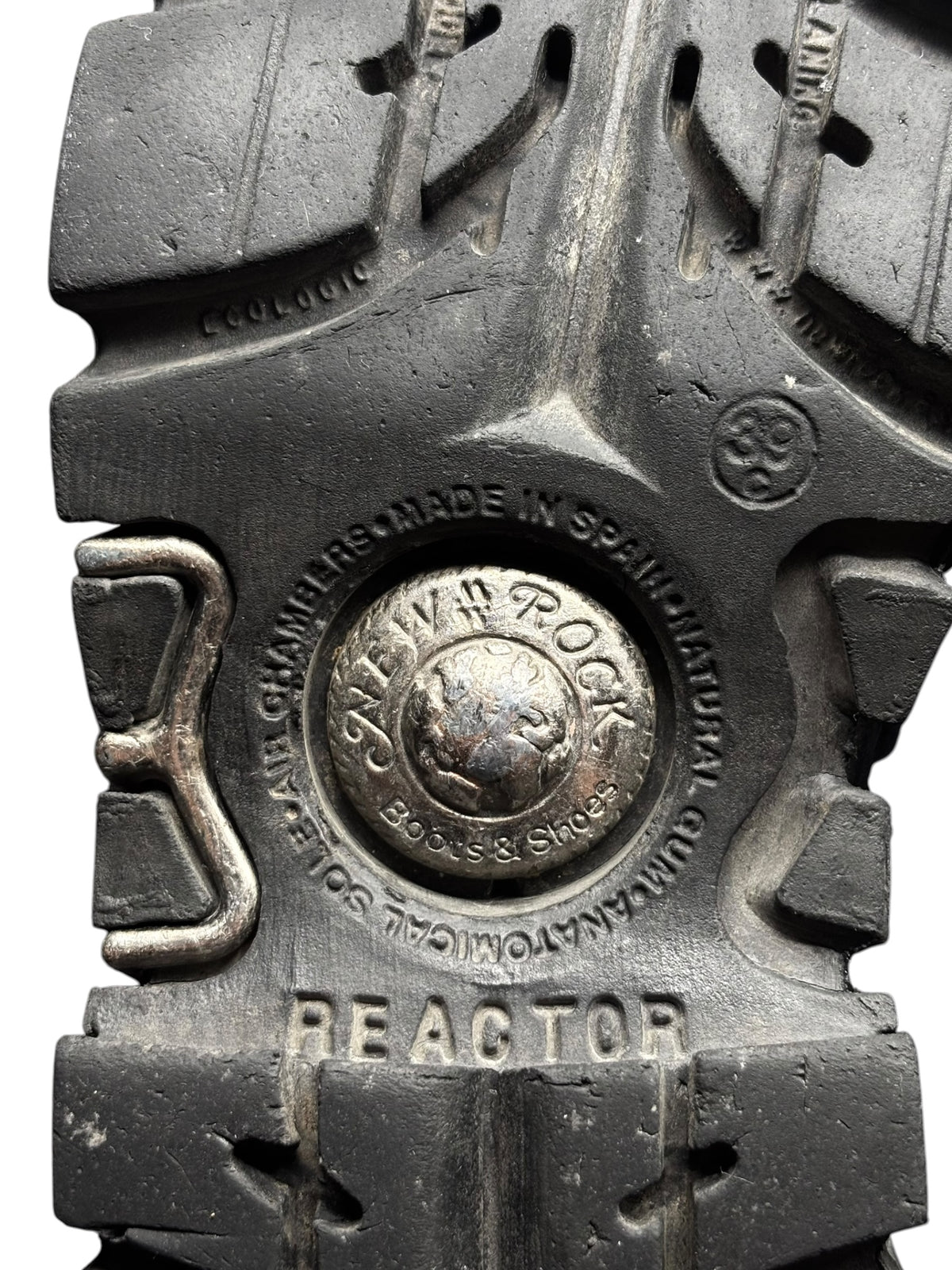 Reactor sole close-up with rugged tread and “REACTOR” branding on black boot outsole